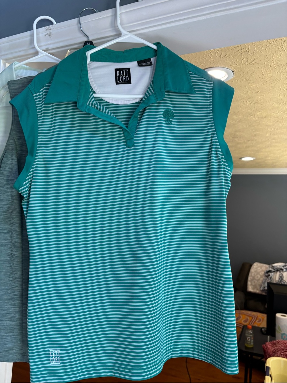 Kate Lord Women's Teal Striped Sleeveless Polo Top